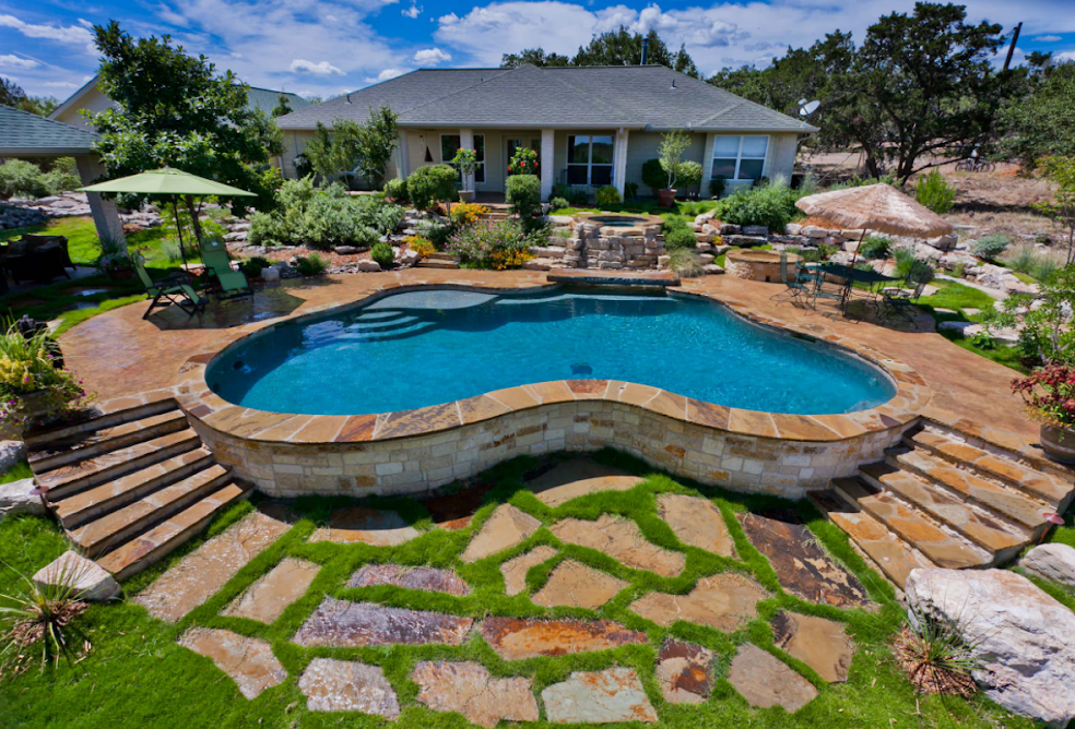 43 Stunning Above Ground Pool Ideas, Above Ground Pool Built Into Hill